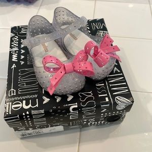 Mini Melissa Glitter clear/pink bow. Size 6.